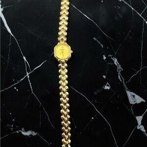 Bulova Gold Bracelet Watch with Hexagonal Dial. Unused. New, old stock.